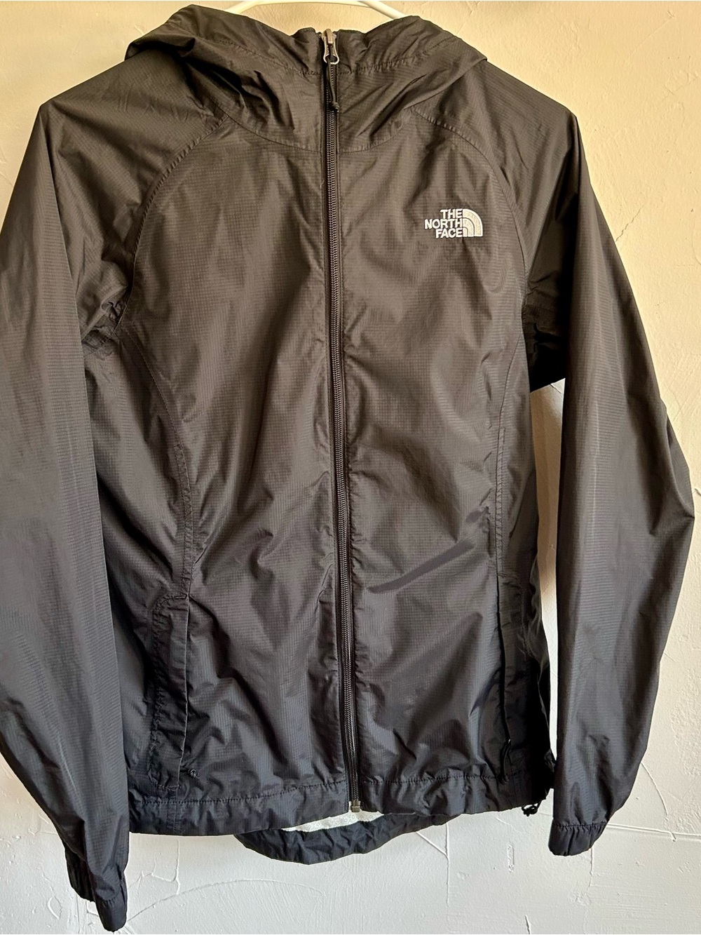 The North Face women’s Black rain Jacket